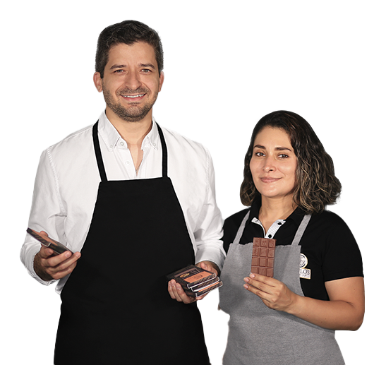 the two founders of camilo's chocolate with bars of chocolate in their hands